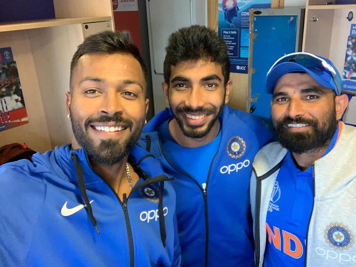 Hardik Pandya with Jasprit Bumrah and Mohamed Shami. Image @Twitter