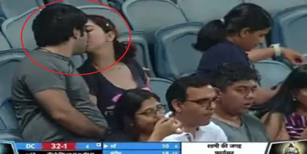 Couple kissing during IPL match