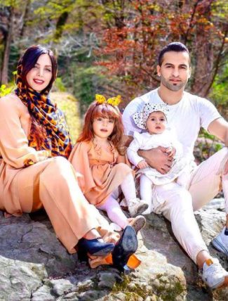 fazel atrachali with his wife and daughter